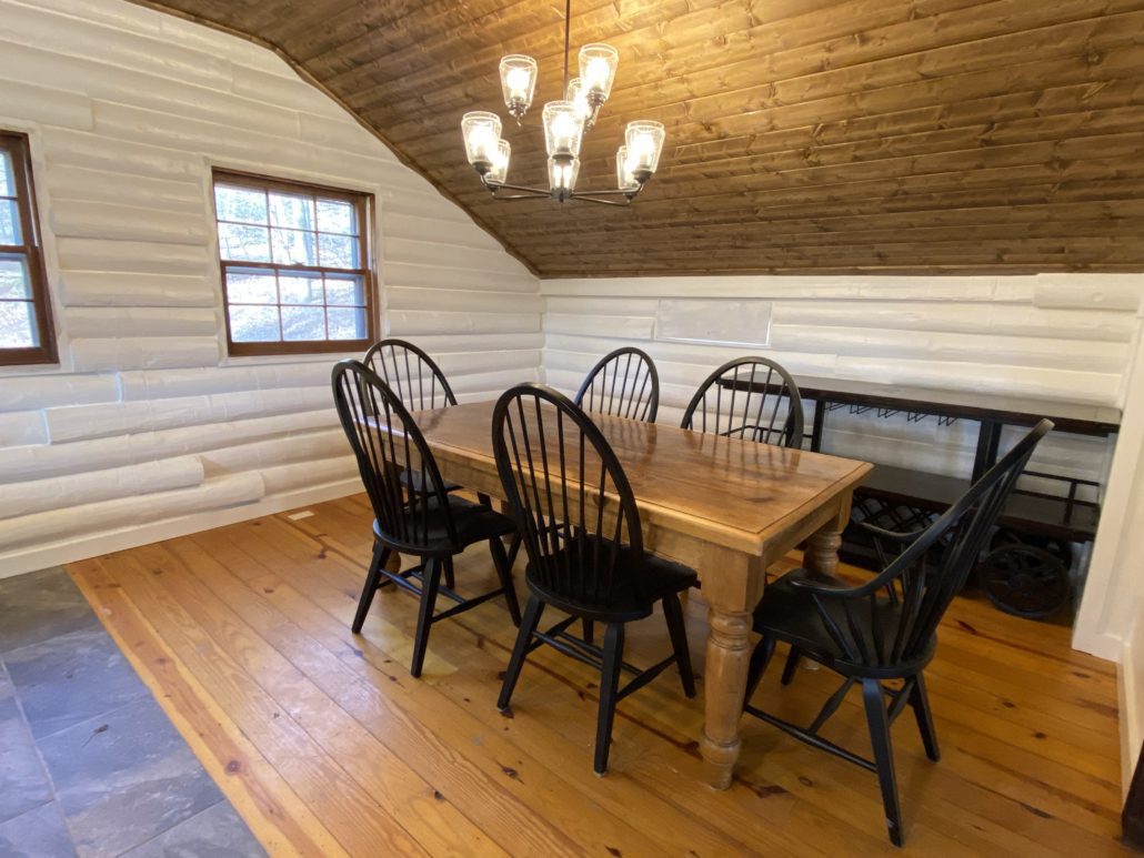 Deerwoode Reserve | Log cabin, dining room.